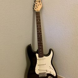 Stratocaster Copy Guitar With Peavey Practice Amp