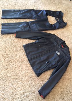 Women's Harley Davidson genuine leather jacket and chaps.