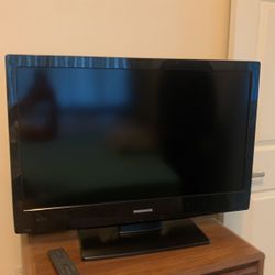 32 inch Magnavox TV with DVD slot