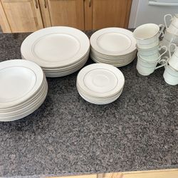 Gold Rimmed Fine Porcelain Plates And Cups  