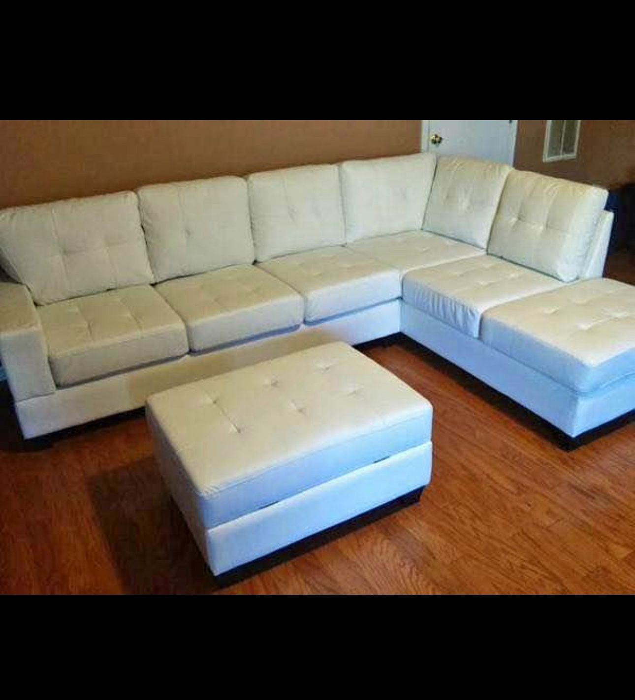 White leather sectional sofa with storage ottoman