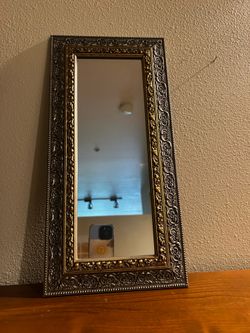 Framed wall mirror