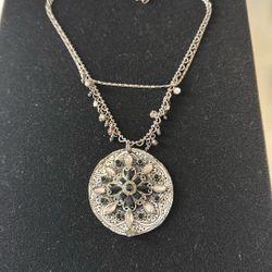 vintage silver-toned filigree medallion pendant necklace with multi-colored bead accent