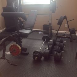 Weight And Bench  And Dumbells