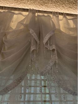 White curtains with beaded valances attached 2 pieces