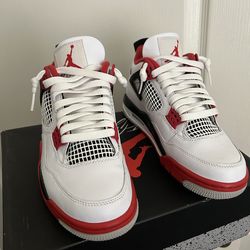 Fire red Jordan 4s