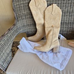 Boots.    Never Used