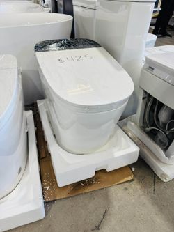 Smart Elongated Toilet Bidet ( White + Black ) with Auto Open, Auto Close, Auto Flush, and Heated Seat in White $425 