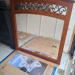 Mirror and Eight Drawer Chest. 