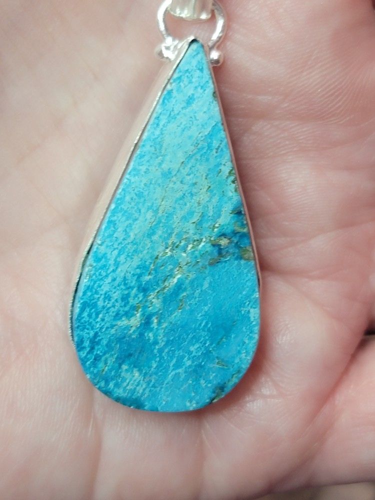 Slid 925 Silver With A Natual Torquoise In It On A 20" Snake Chain.