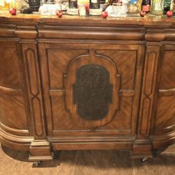 Antique  Bar Buffet with Stone Top, Wine Rack, Drawers, and Shelves on wheels