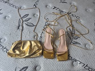 Gold heels and matching bag