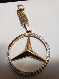 18k gold benz pendant with vs diamonds