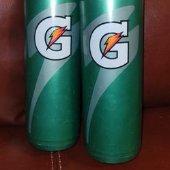 2 Gatorade 32 oz Squeeze Water Sports Bottles. 
The bottles are made of durable, BPA-free plastic. 
They feature a self-sealing, no-drip valve system 