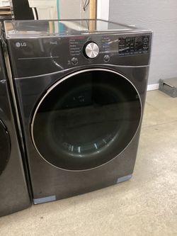 LG 7.4 cu.ft. Vented Smart Stackable Electric Dryer with TurboSteam and Sensor Dry New Scratch and Dent