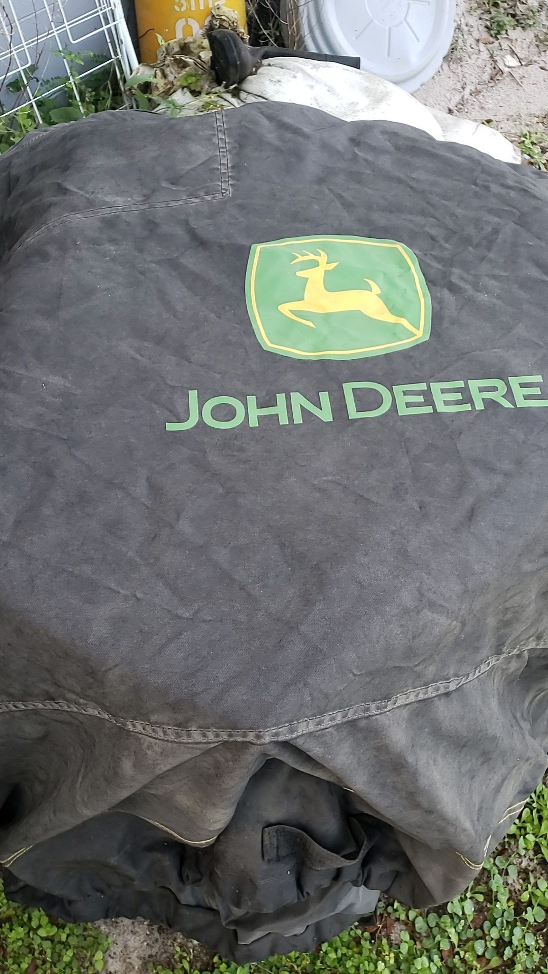 John Deere riding lawn mower cover.