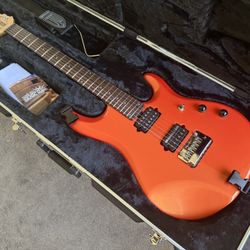 Ernie Ball Music Man JP6 John Petrucci Signature in Tangerine Pearl