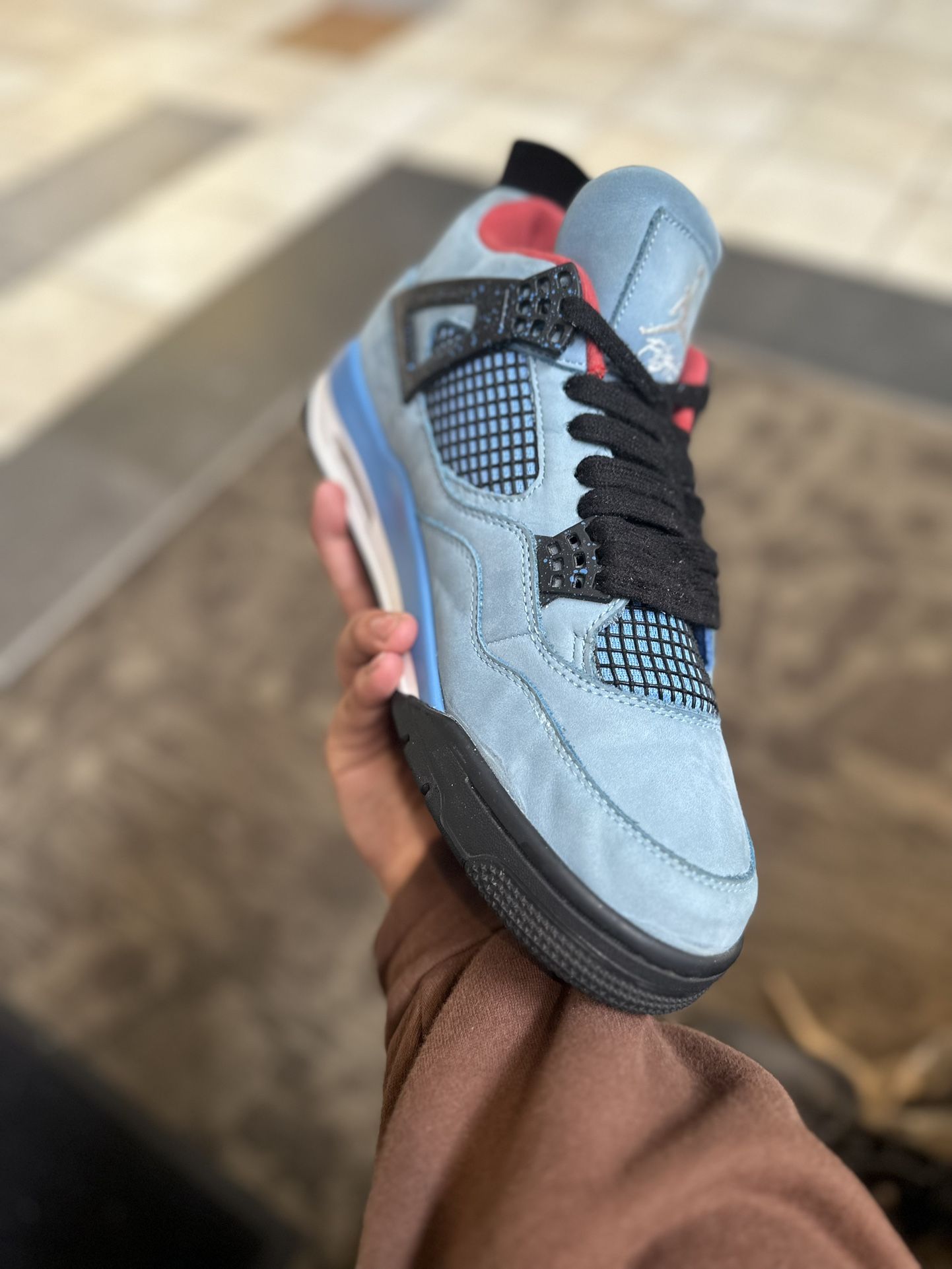 Jordan 4 Travis Scott