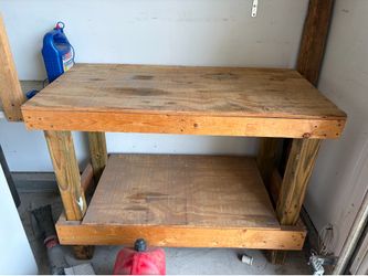 2 wooden work benches