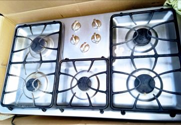 G E Electric stainless steel 5 burner stove