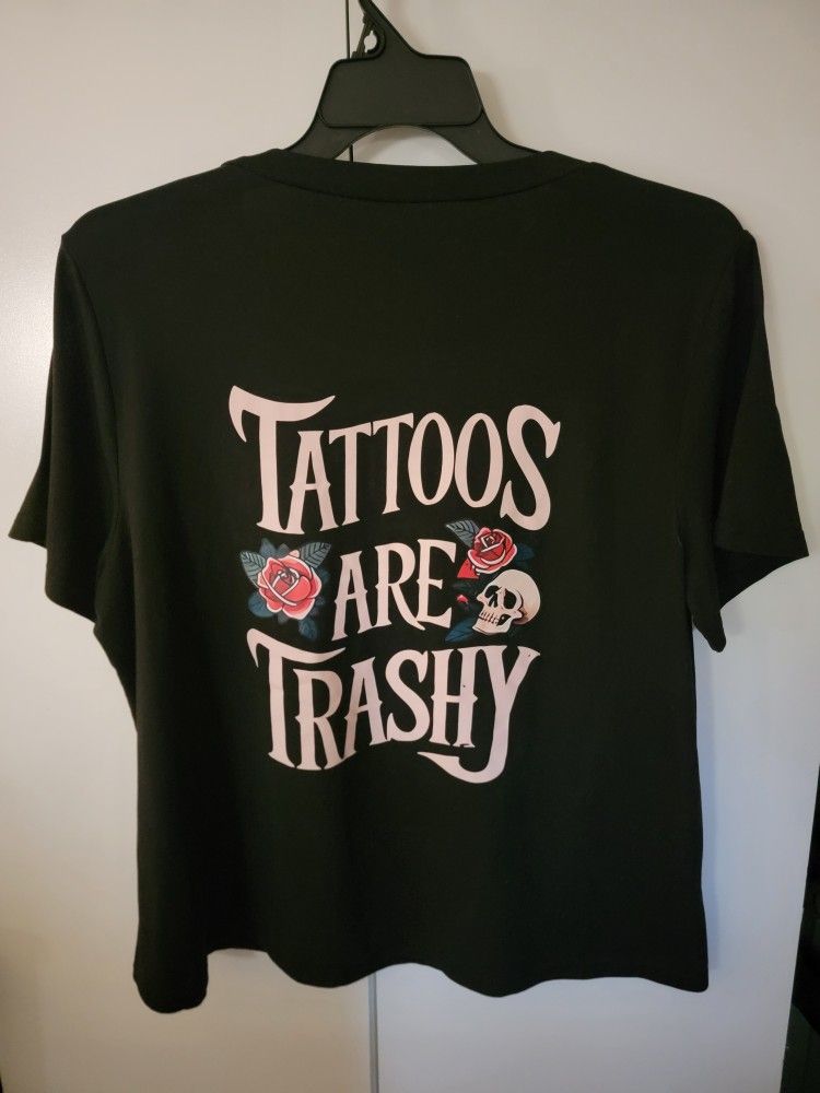 Black short-sleeved t-shirt with a "Tattoos Are Trashy" graphic print with roses and a skull. Size 2XL
