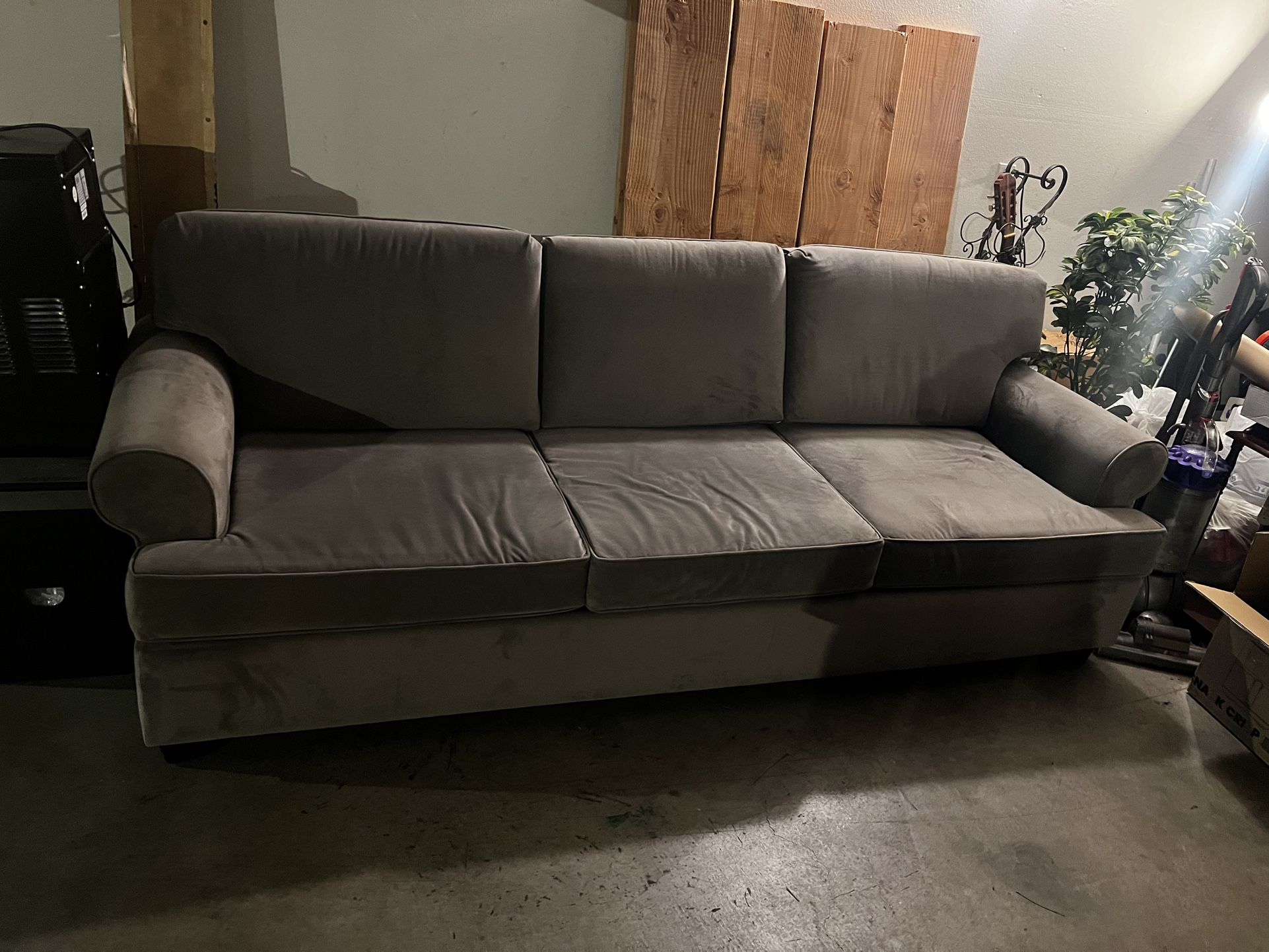 Grey three seater Couch