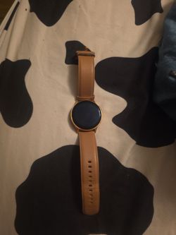 This is a Samsung Galaxy Watch Active2 with a pink or gold-tone case