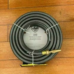 50ft Garden Hose New With Nozzle $25.00