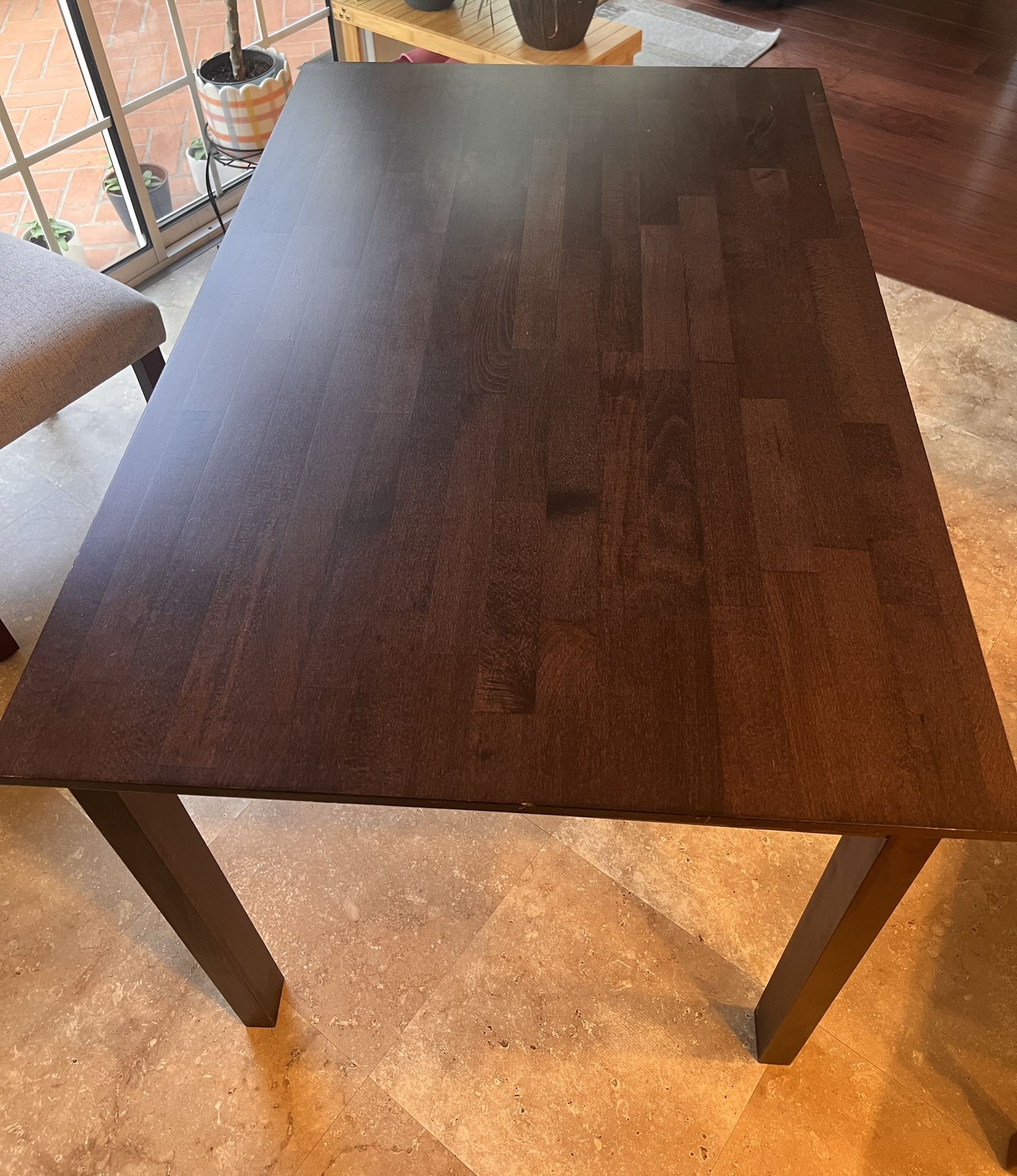Dining table and chairs and lamp