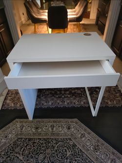 white desk with a drawer.