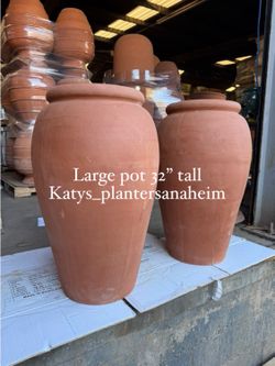 Taller clay urns 32”H $115 ea