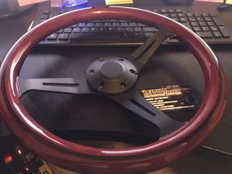 Black wood steering wheel with late model GM Adapter $199