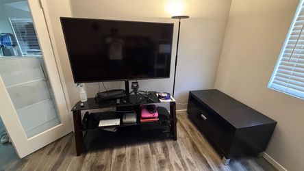 TV stand/media center with glass shelves  and free 60” LG flatscreen TV. Works!