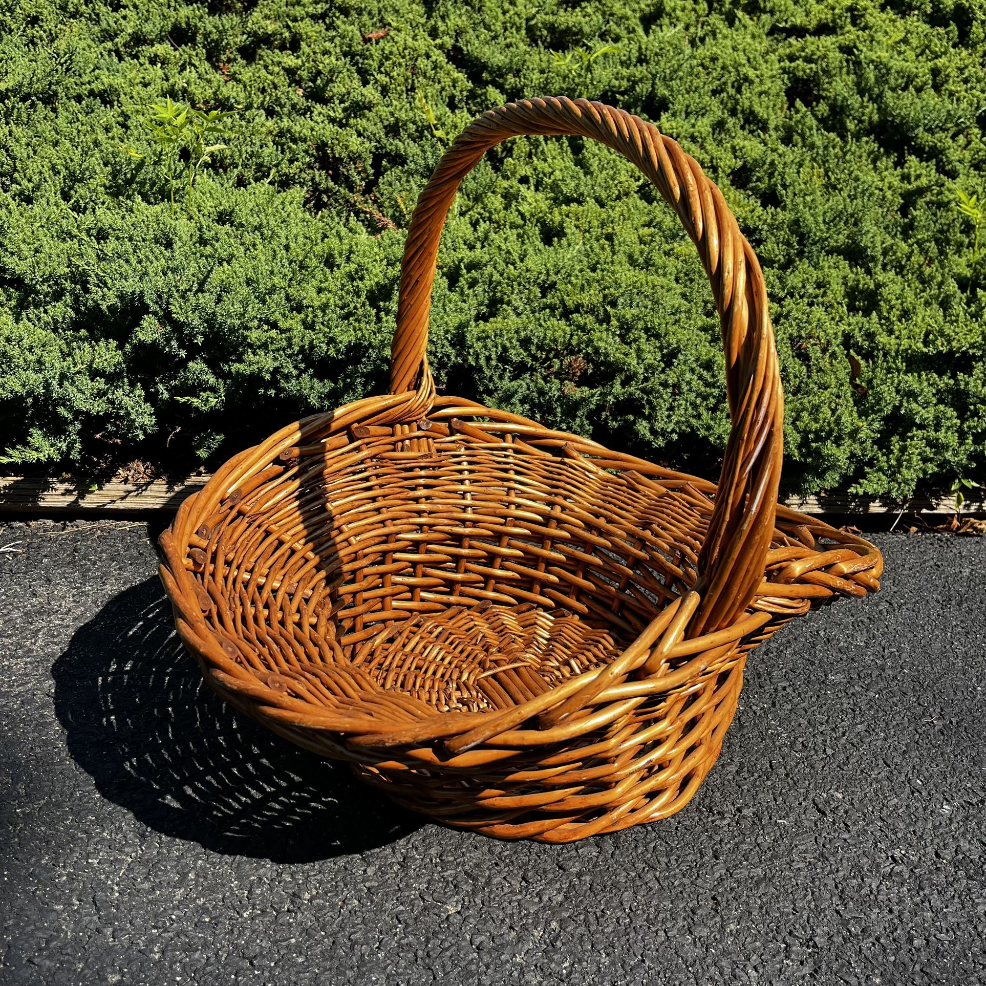 large sturdy wicker basket with a handle