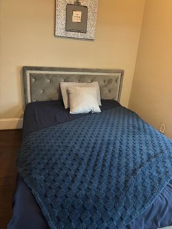 Queen bed with mattress and bedframe and headboard