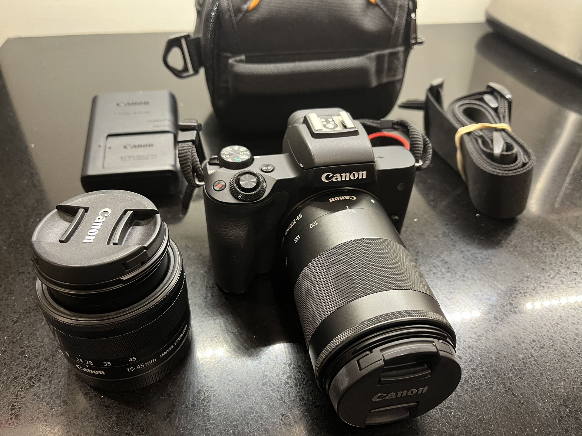 Canon M50 w. 15-45mm and 55-200mm lenses