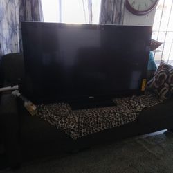 65 Incn TV WITH REMOTE.