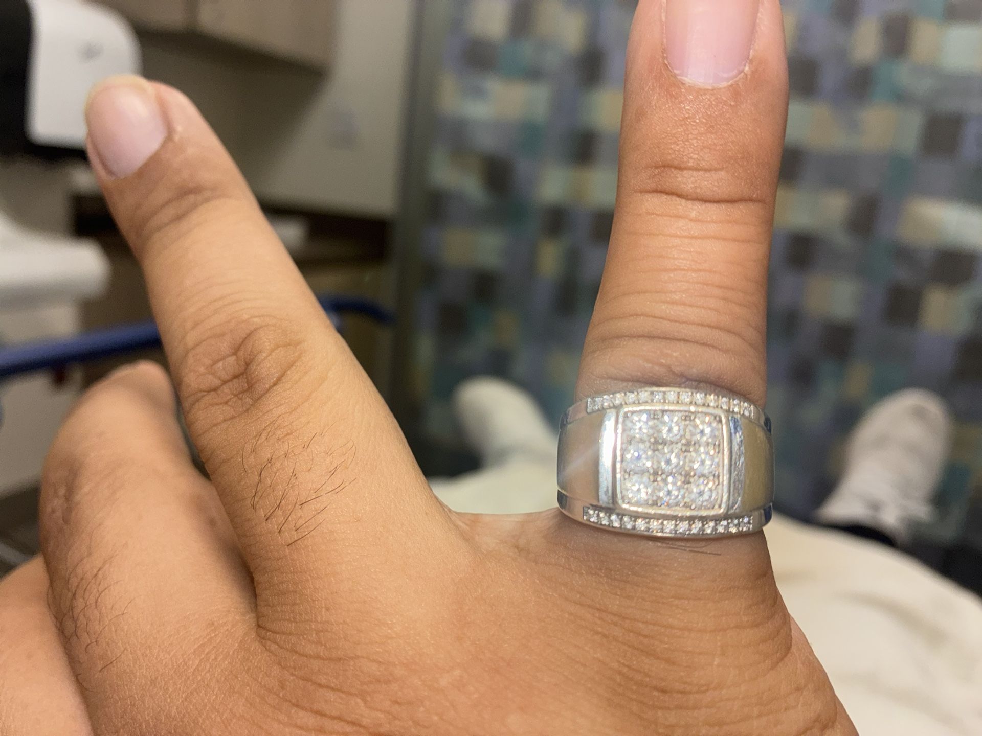 AI Overview This is a men's 14k two tone gold ring with a square cluster of nine round diamonds.
