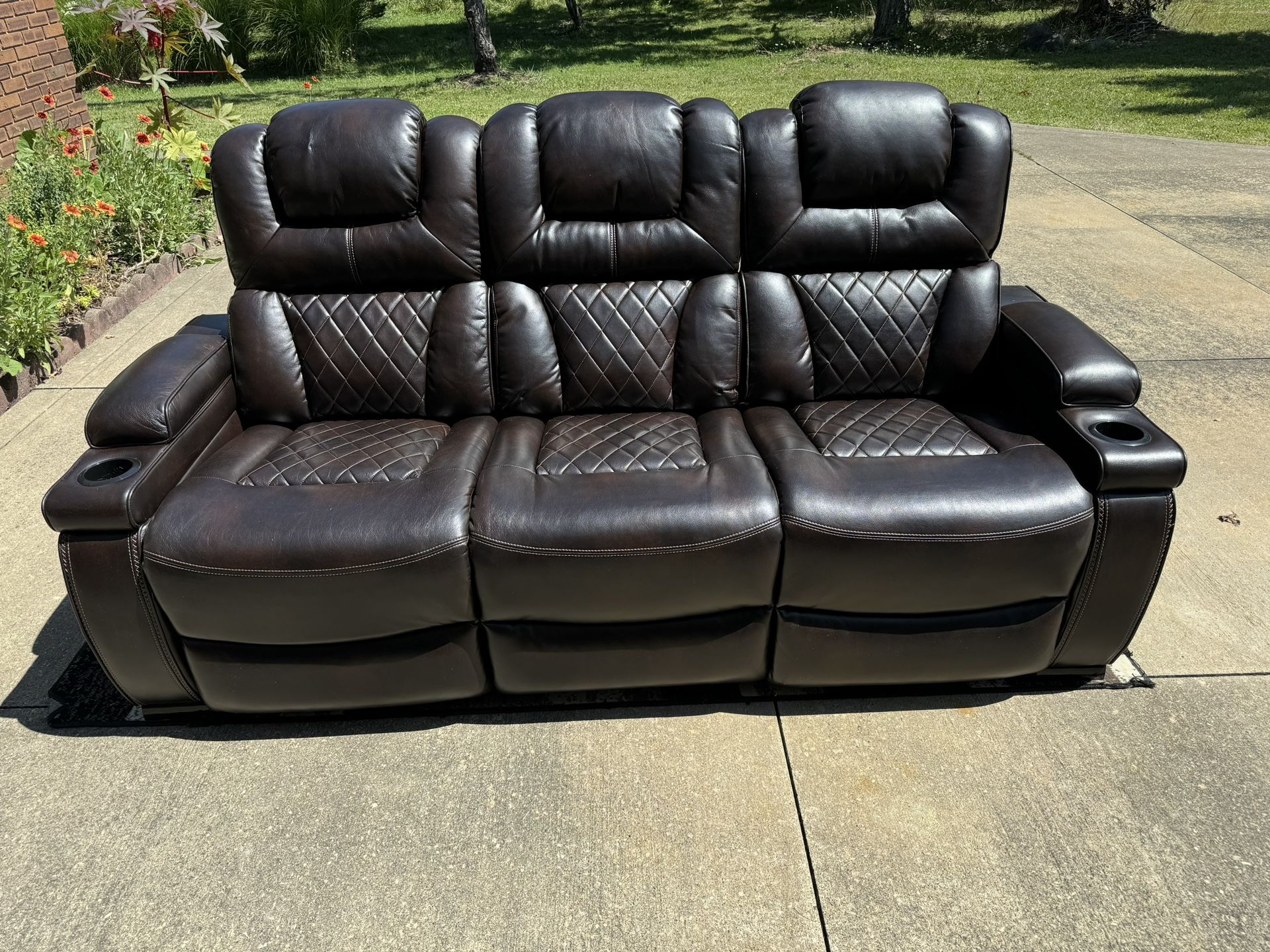 Like new living room set! Adjustable electric reclining sofa, loveseat, recliner. W/ Coffee table.