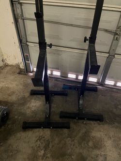 Squat rack with safety bars