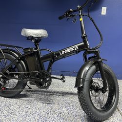 UNIBIKE 28mph, 48v 15.ah Removable Battery , 20 Inch Fat Tires  
