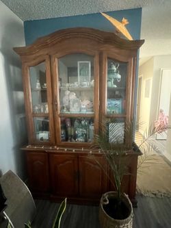 $50.00 Wood 6.9 Ft tall by 5 ft wide curio cabinet