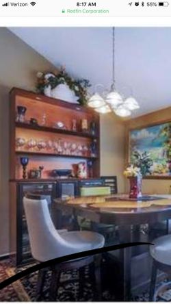 Best offer for the wall unit. It fits in the a car or suv easy. They are 2 separate items. There is a bottom with shelves and a glass doors. The top