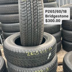 265/60R18 Bridgestone $300. 99% Life used Set. We Have Many Used AND New tires. 