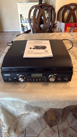 New open box Jensen 3 speed turn table with MP3 encoding  and AM FM radio