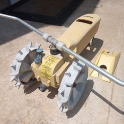 Walking Tractor Lawn Sprinkler.