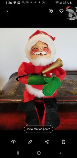Vintage Annalee mobilitee Santa with a horn.