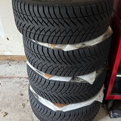 Wheel and tire set of 4 - 5x120.65 mm / 18” x 8.5” +20 Offset