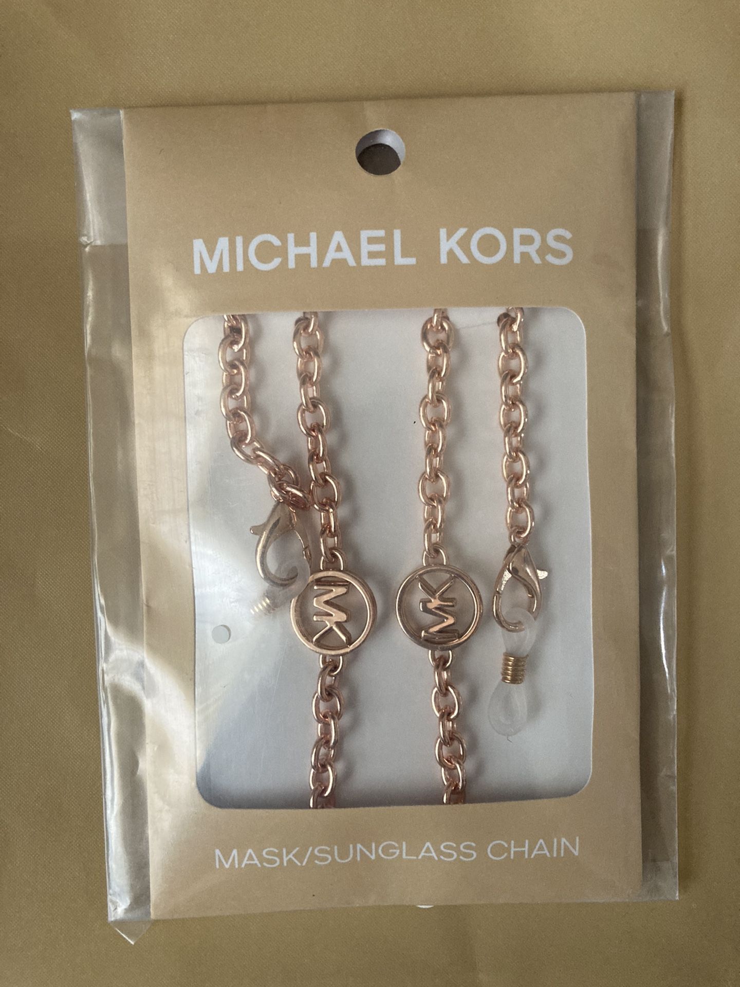 NEW, sealed Michael Kors mask/sunglass chain, rose gold