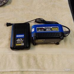 40 VOLT. MAX. LITHIUM ION.  5.0 AH   &. CHARGER.     100 BUCKS.    190 AT LOWES